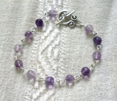 bracelet de pierrers rondes - fluorine violette